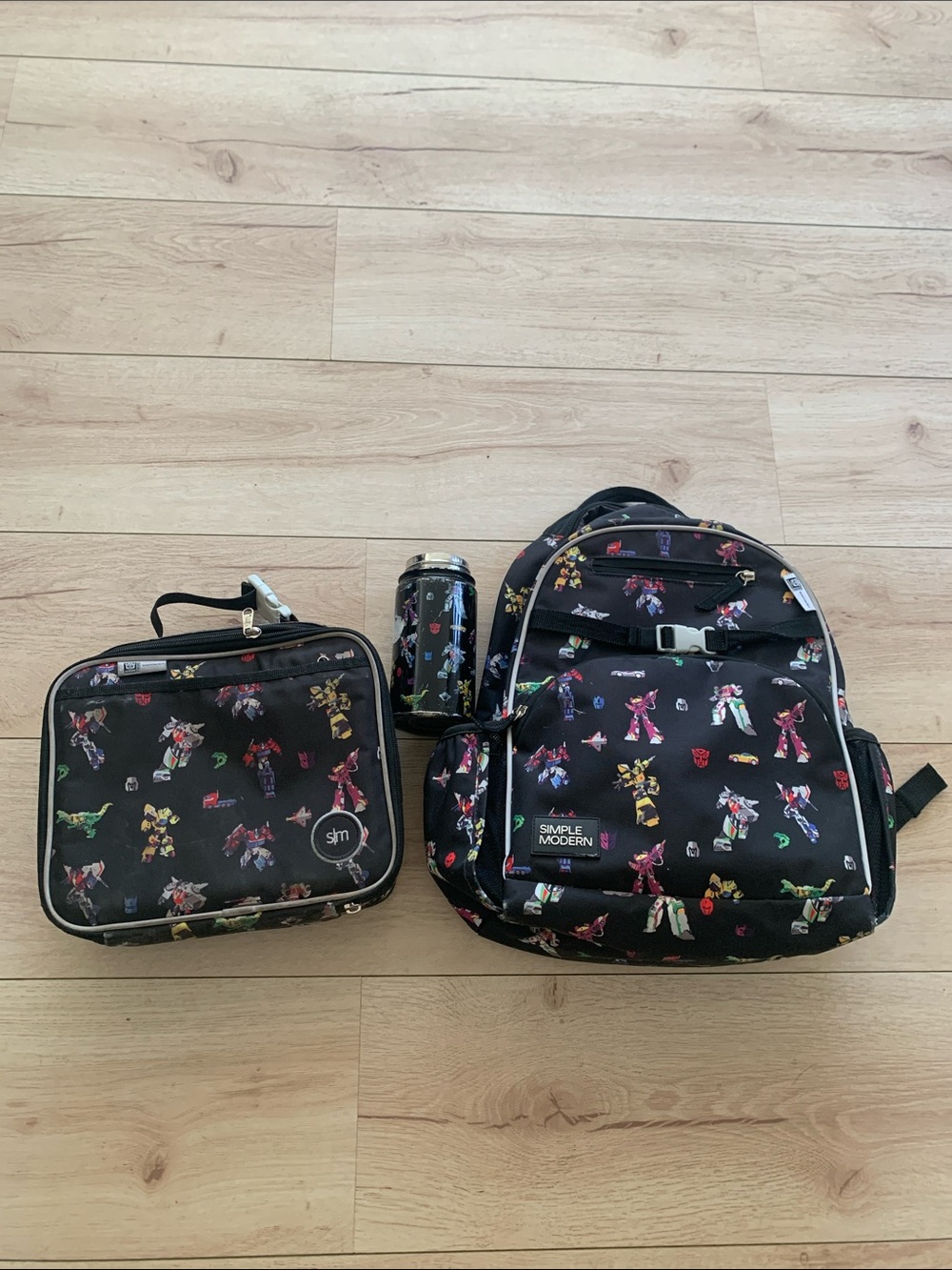 Simple Modern transformer backpack lunch box and water bottle